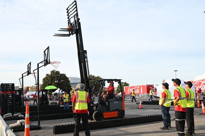 AC-CCSWB Truck Rodeo participants drive a forklift during the competition.