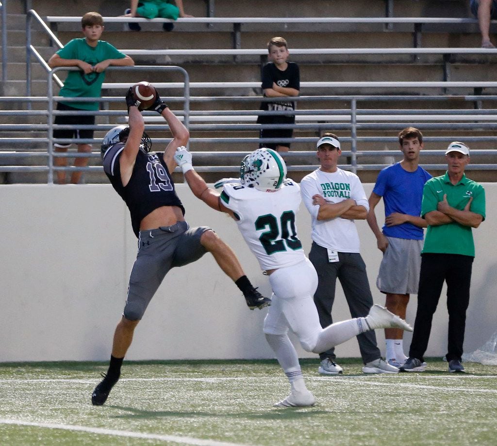 Denton Guyer's Seth Meador (19) catches a pass for a touchdown in front of Southlake...