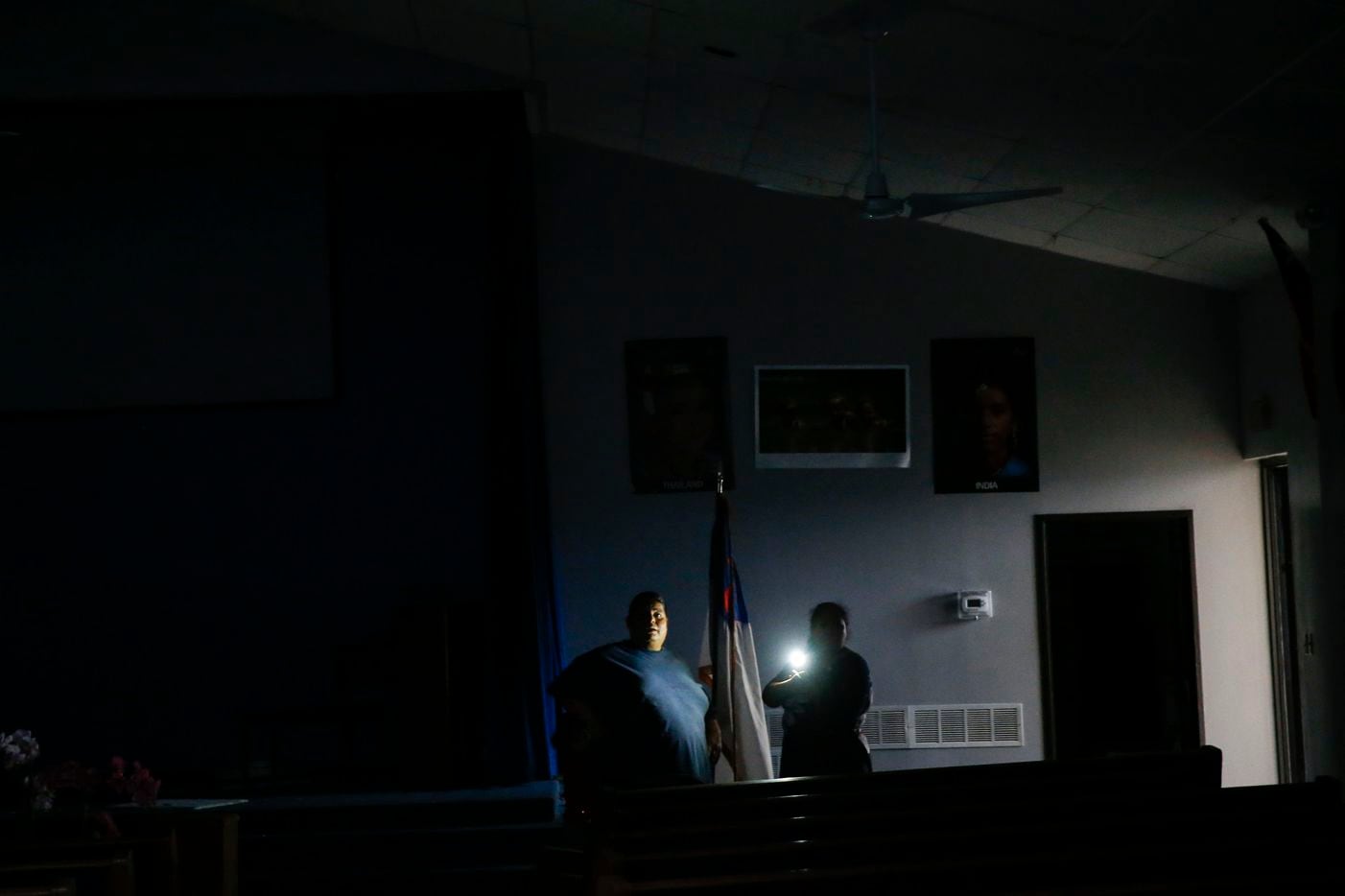 Church goers of Primera Iglesia Dallas view damage left behind by a Sunday night tornado is...