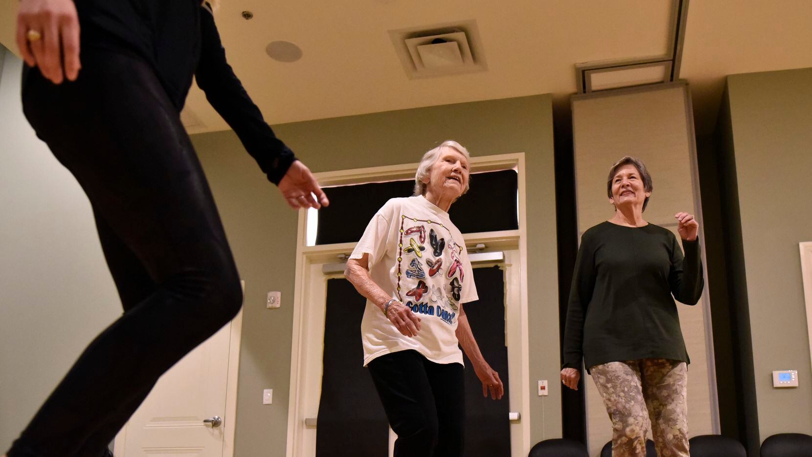 Coila Stevens (left) and Pam Spell, 77, sway to the music during a dance class with other seniors at Presbyterian Village North in Dallas.