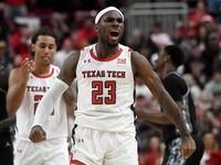 Texas Tech's guard De'Vion Harmon (23) celebrates a foul during an NCAA college basketball...