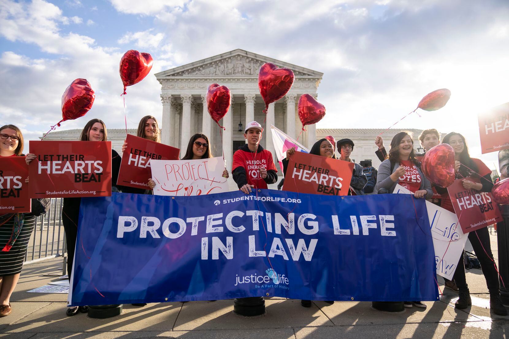 Anti-abortion demonstrators rally outside the U.S. Supreme Court on Nov. 1, 2021 during arguments on Senate Bill 8, the controversial Texas law that bans abortions after 6 weeks.