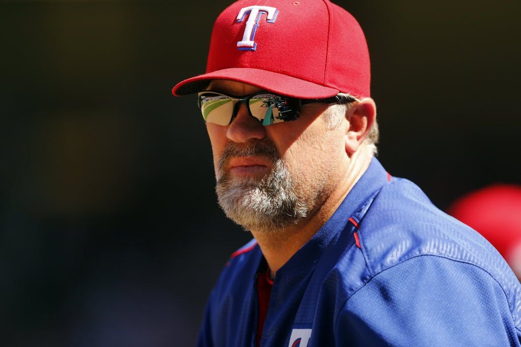Texas Rangers pitching coach Doug Brocail is seen in the dugout during the Seattle Mariners...