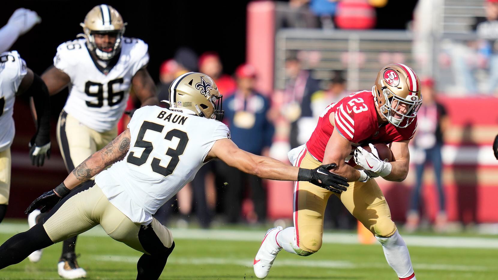 San Francisco 49ers running back Christian McCaffrey (23) runs against New Orleans Saints...