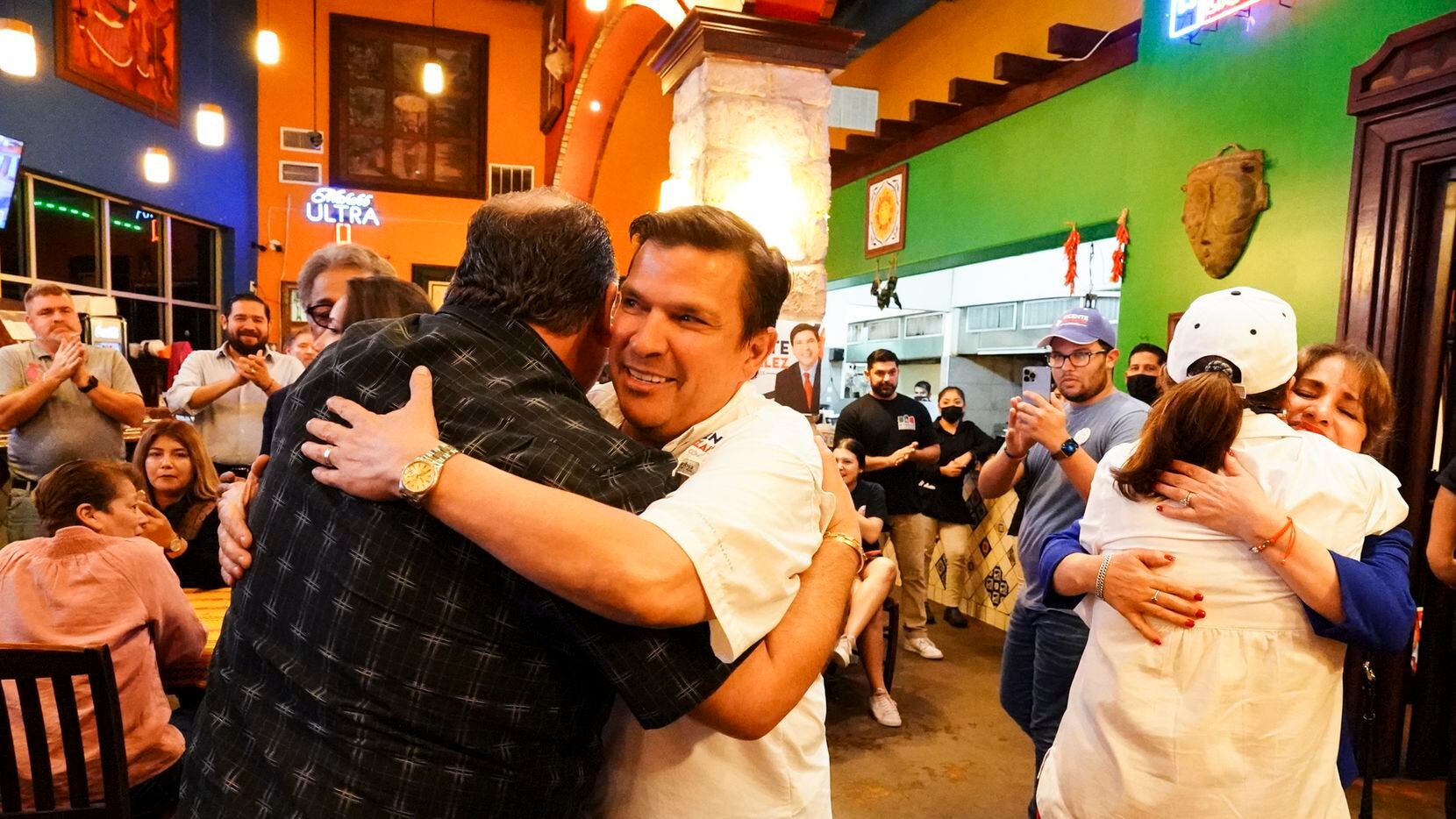 District 34 candidate U.S. Rep. Vicente Gonzalez hugs a supporter Tuesday, Nov. 8, 2022, at...