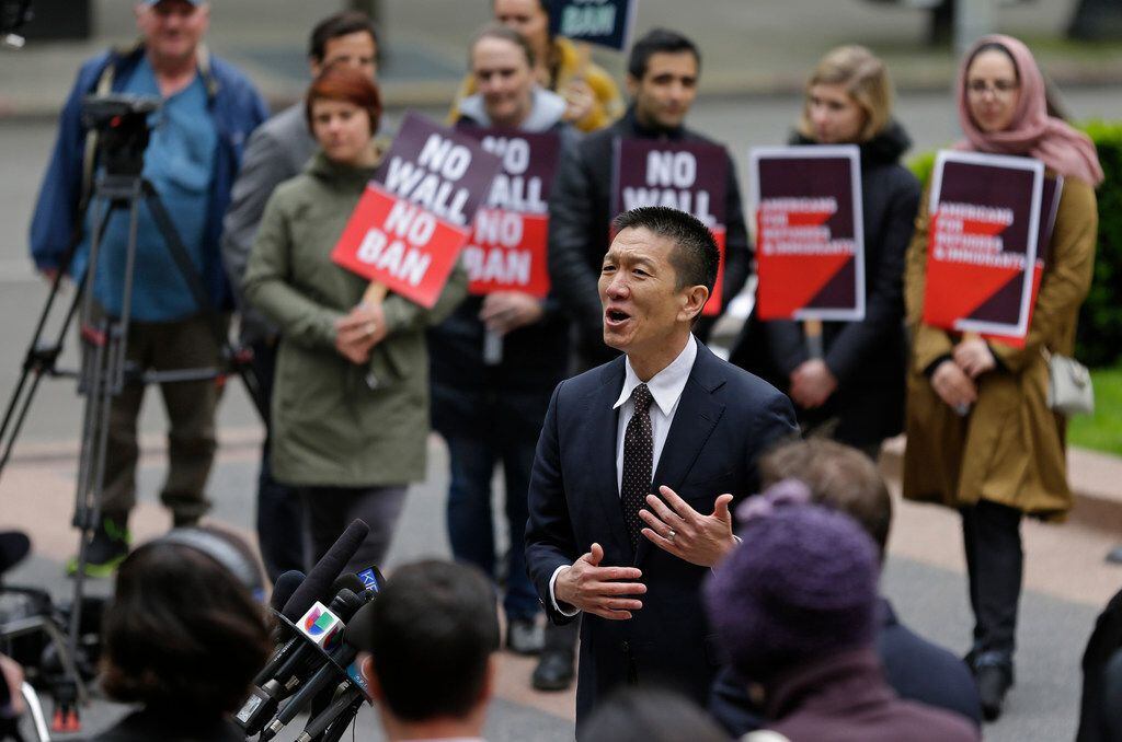 Hawaii Attorney General Doug Chin talks to reporters on May 15 outside a federal courthouse...