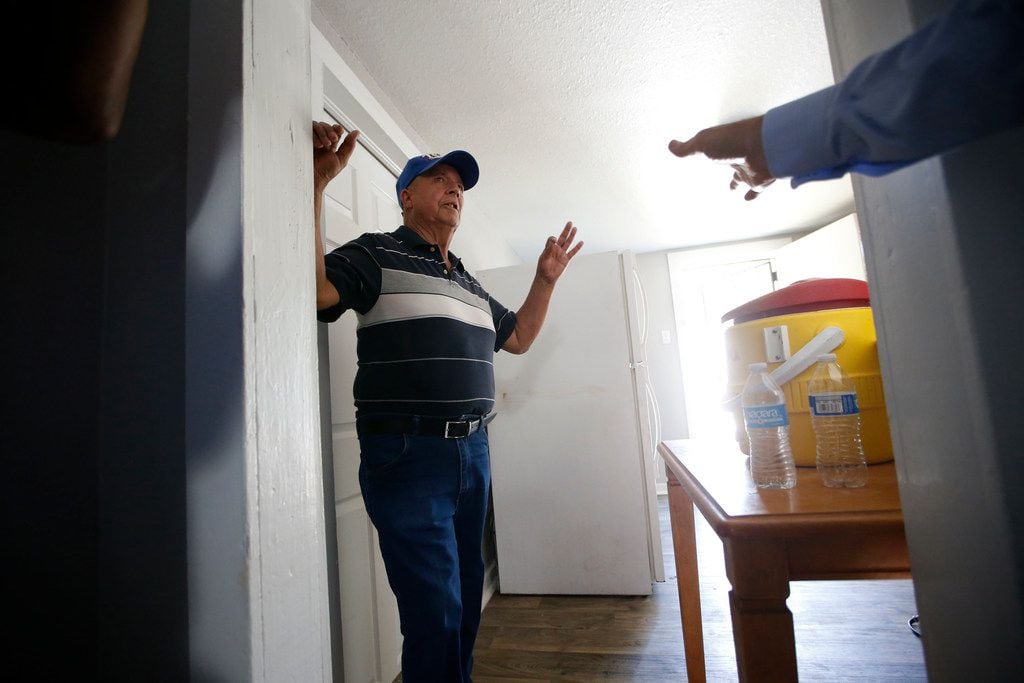 Julian Campos gives a tour of his home after a news conference announcing a federal lawsuit...