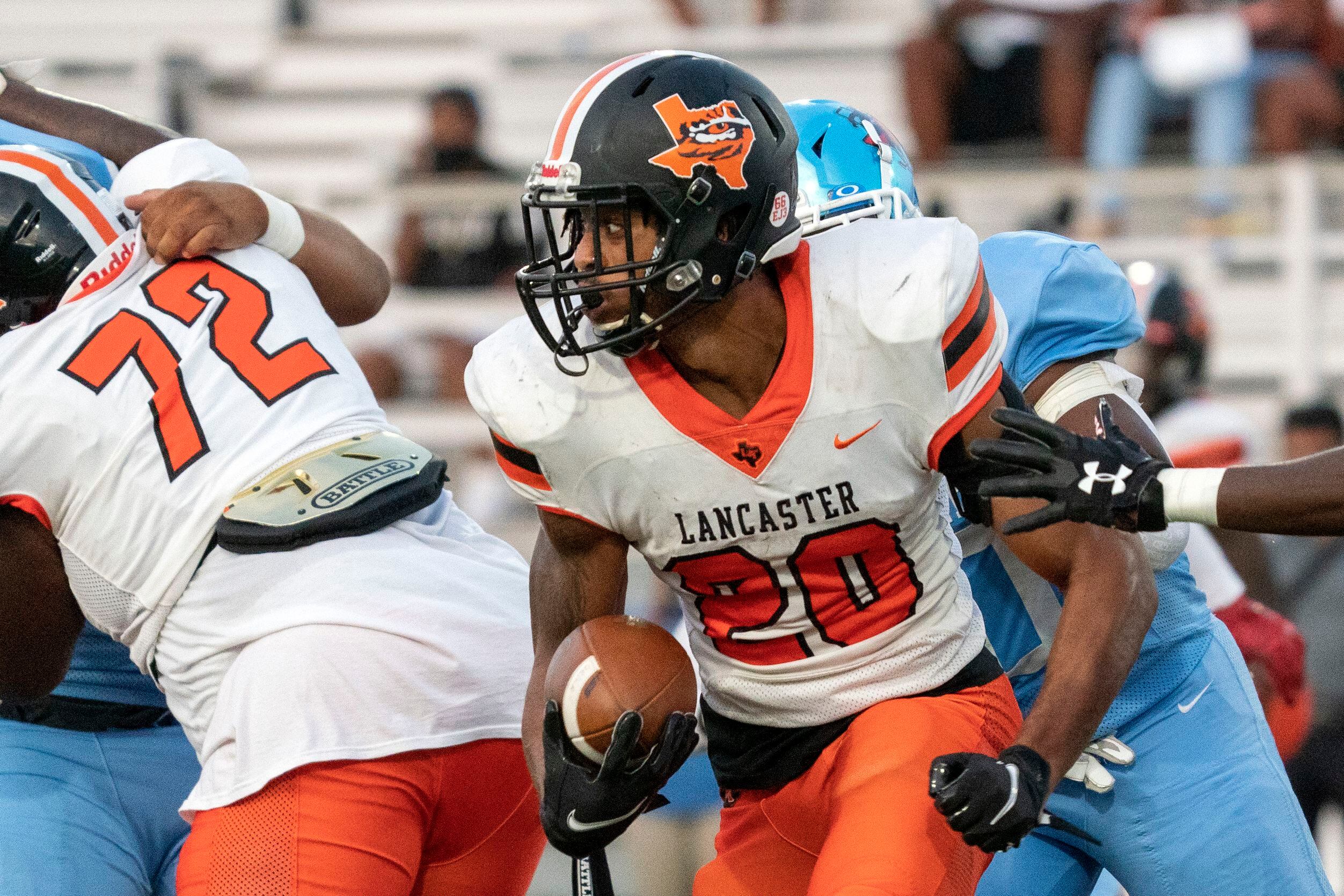 Lancaster running back Isaiah Broadway (20) turns upfield against Skyline during the first...