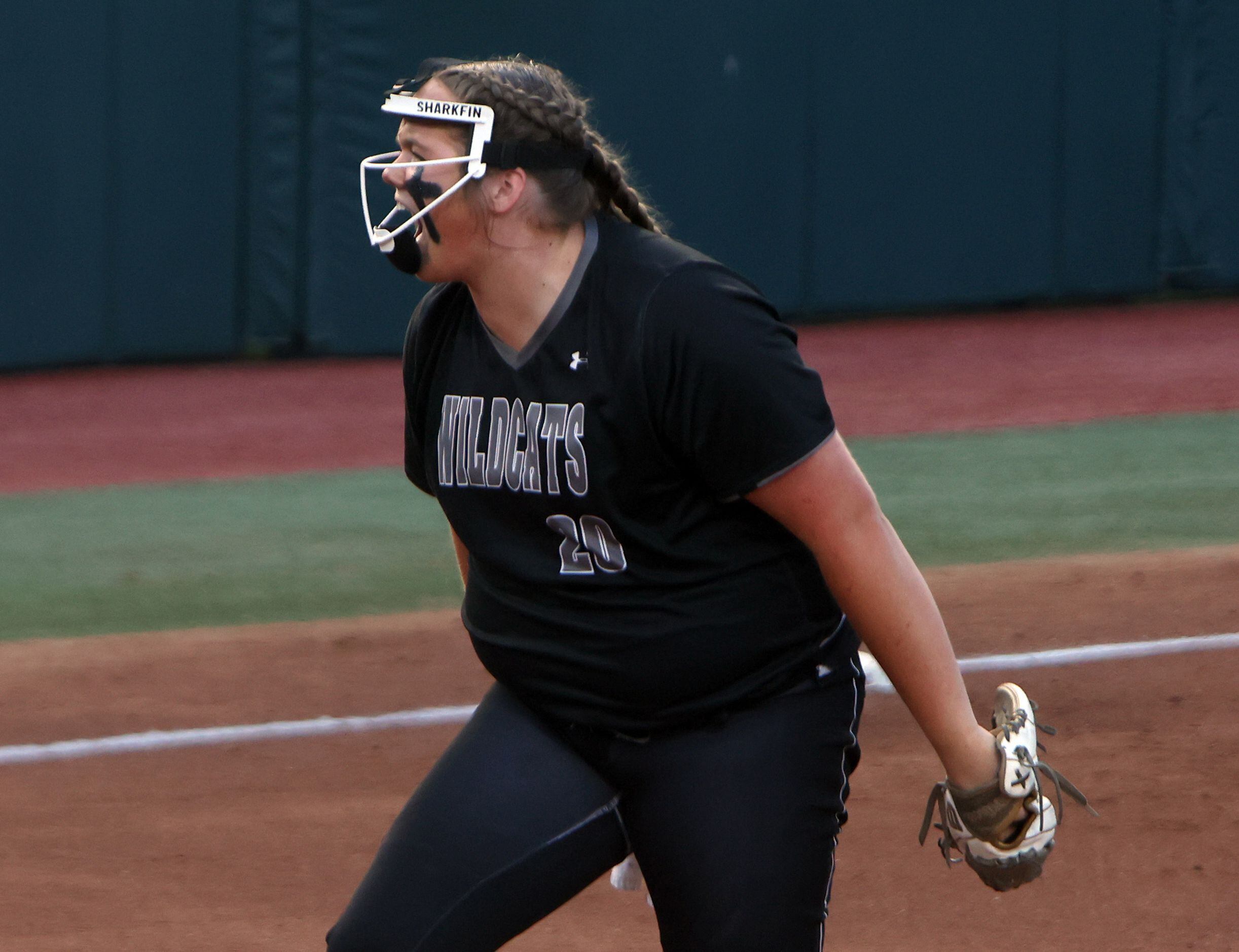 Denton Guyer pitcher Finley Montgomery (20) lets out a yell after retiring a Bridgeland...