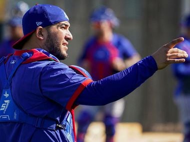Texas Rangers catcher Jose Trevino works in the bullpen during a training workout at the team's training facility on Thursday, Feb. 13, 2020, in Surprise, Ariz.