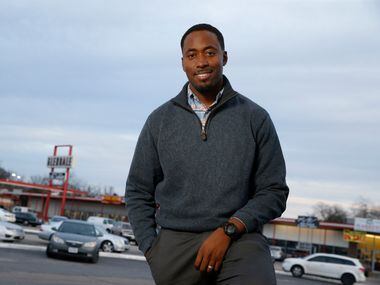 Taylor Toynes, the Oak Cliff community activist poses for a portrait on the corner where his...