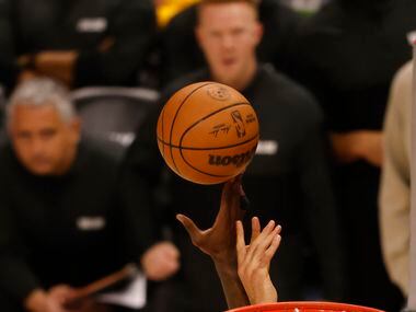 jDallas Mavericks forward Dorian Finney-Smith (10) fouls Utah Jazz center Rudy Gobert (27)...