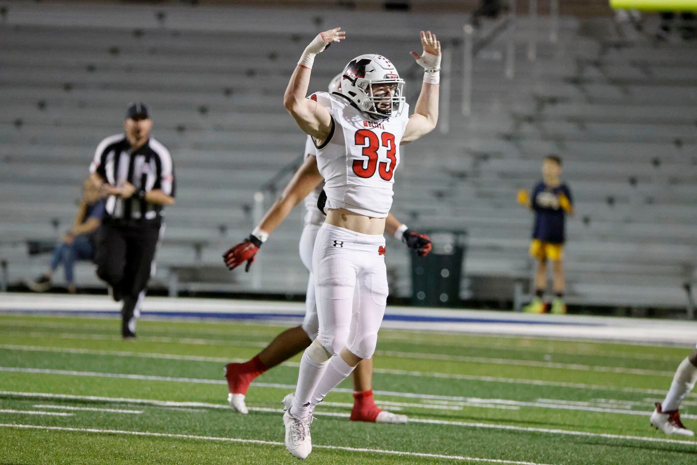 Melissa linebacker Jayson Cave (33) celebrates as they got the ball on downs from Stephenville during the first half of a Class 4A Division I Region II final high school football game in Bedford, Texas on Friday, Dec. 3, 2021. (Michael Ainsworth/Special Contributor)