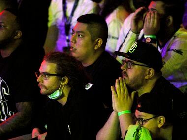 OpTic Texas fans watch intently during the team's opening match win against London Royal...