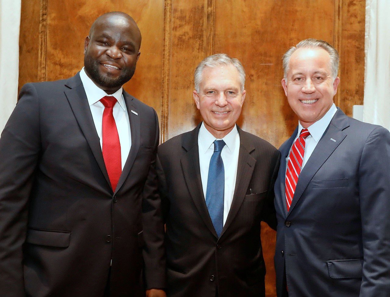 From left: John Olajide, 2020 chairman of the Dallas Regional Chamber, Dale Petroskey, chamber CEO, and Toyota executive Chris Nielsen, immediate past chamber chair, at the organization's annual meeting in January.