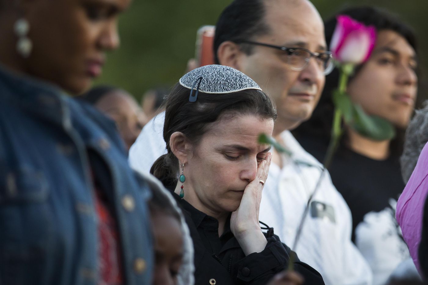 Rabbi Elana Zelony bows her head during the "Remember His Name: Vigil for Jordan Edwards"...