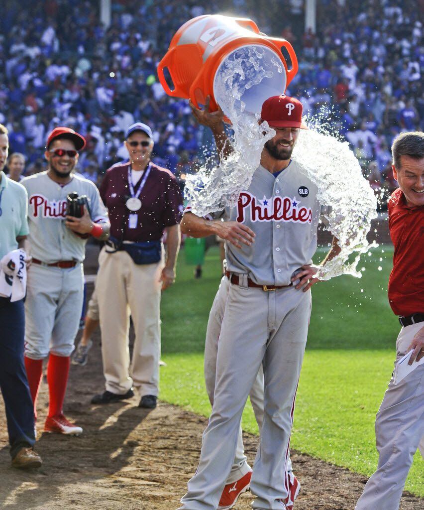 Philadelphia Phillies starter Cole Hamels gets doused after pitching a no-hitter against the...