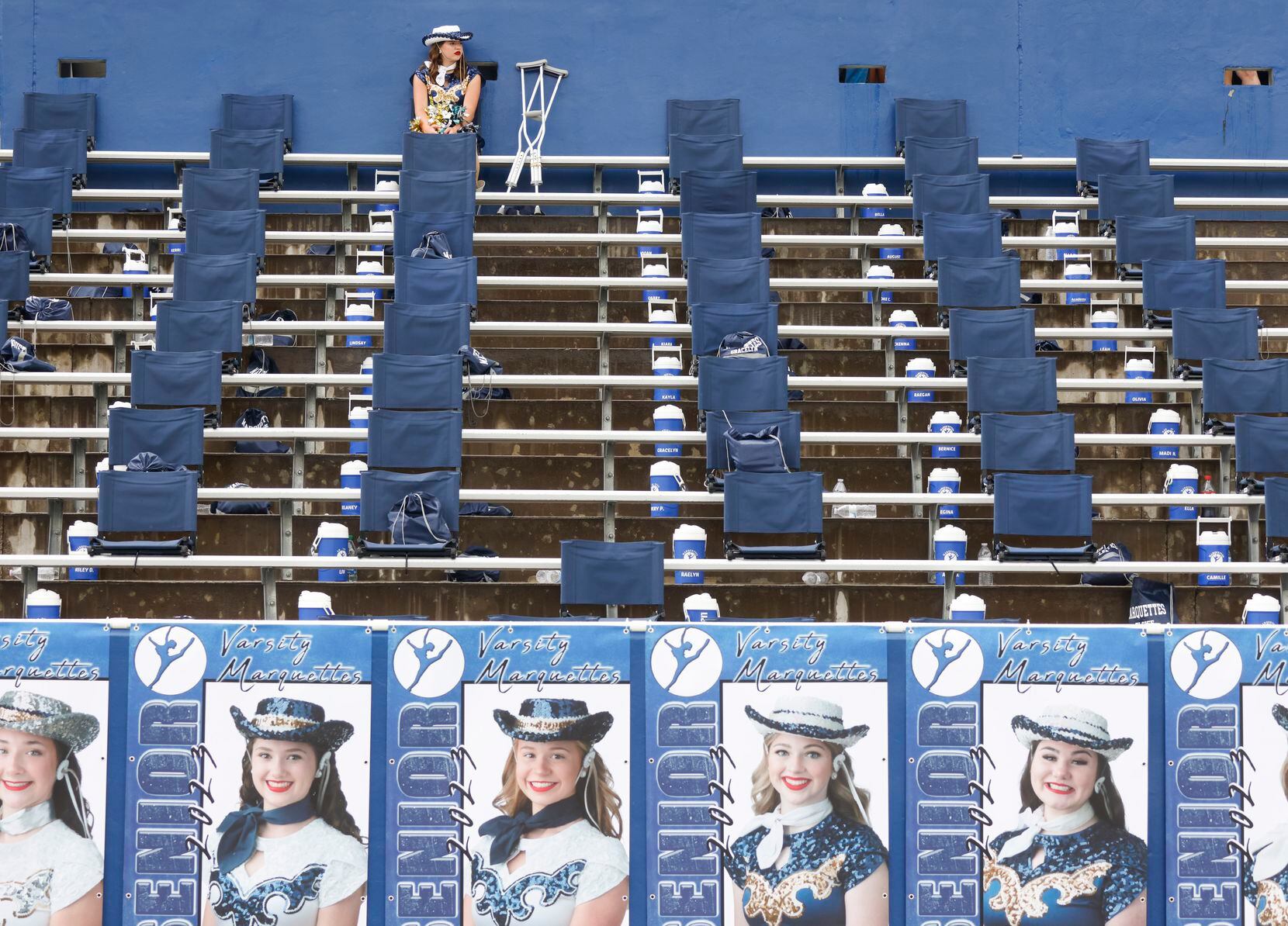 A McKinney Marquettes team member sits during a season-opening football game against Temple...