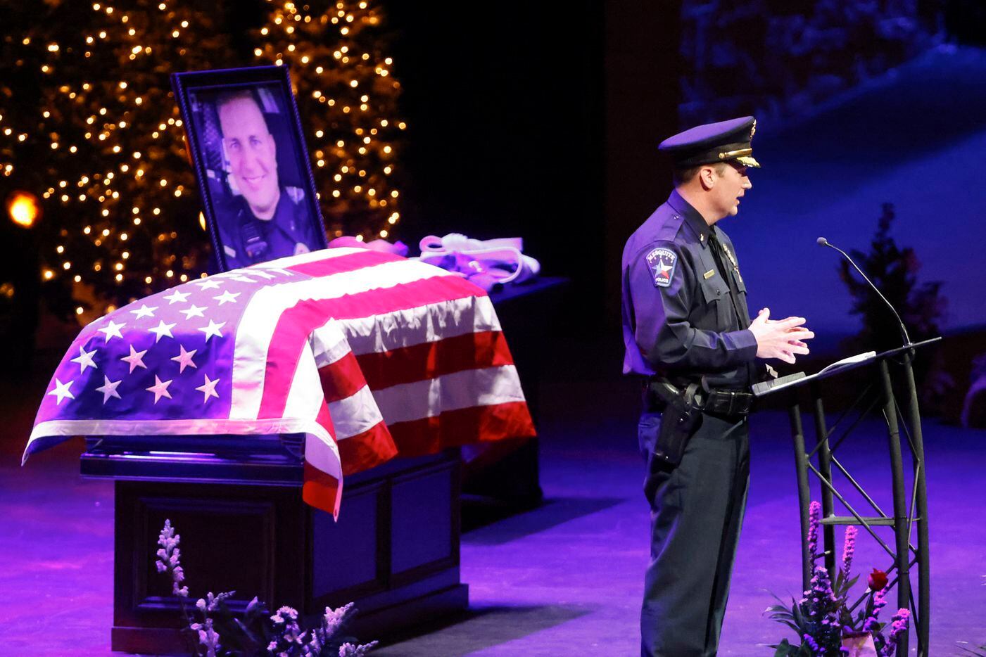 Mesquite Assistant Chief of Police Doug Yates delivers a eulogy during a funeral for...