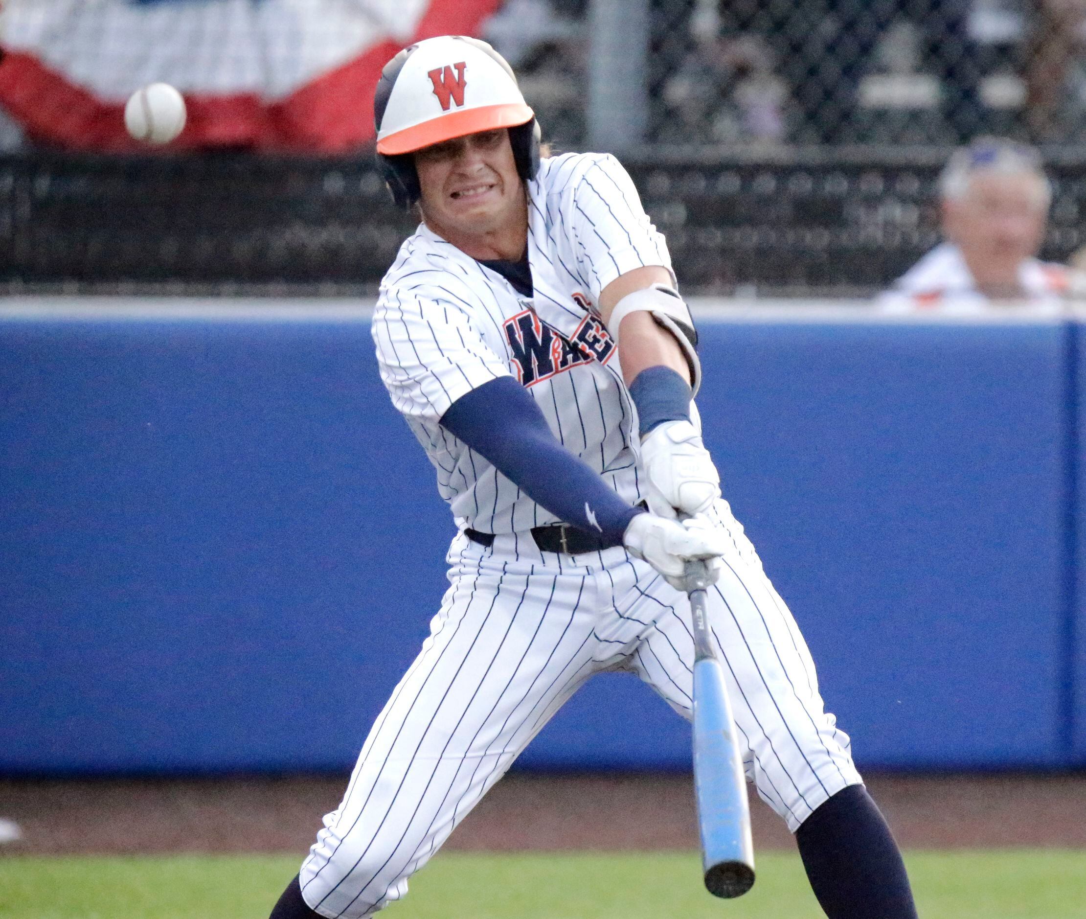 Wakeland High School right fielder Brennan Myer (19) foul tips a pitch in the second inning...