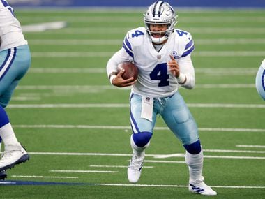 Dallas Cowboys quarterback Dak Prescott (4) runs up the field during second half of play against the Atlanta Falcons in the home opener at AT&T Stadium in Arlington, Texas on Sunday, September 20, 2020. Dallas Cowboys defeated the Atlanta Falcons 40-39.
