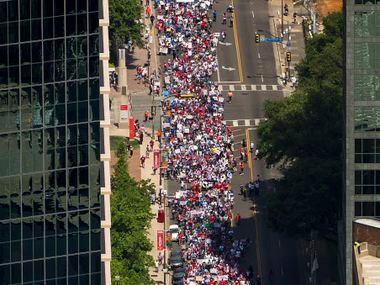 Demonstrators fill Ross Avenue during the 2017 Dallas Mega March on Sunday, April 9, 2017....