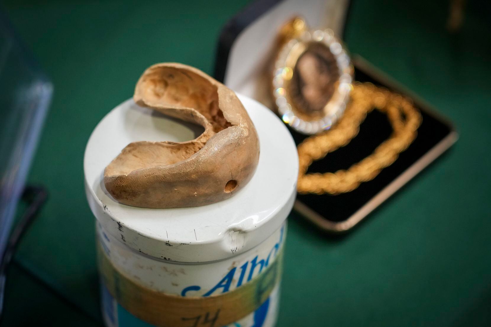 1974 Muhammad Ali mouthpiece from "The Rumble in the Jungle" is displayed during a press...
