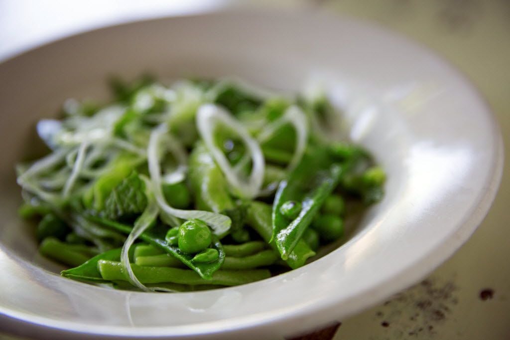 Strascinati with peas, spring onion and mint