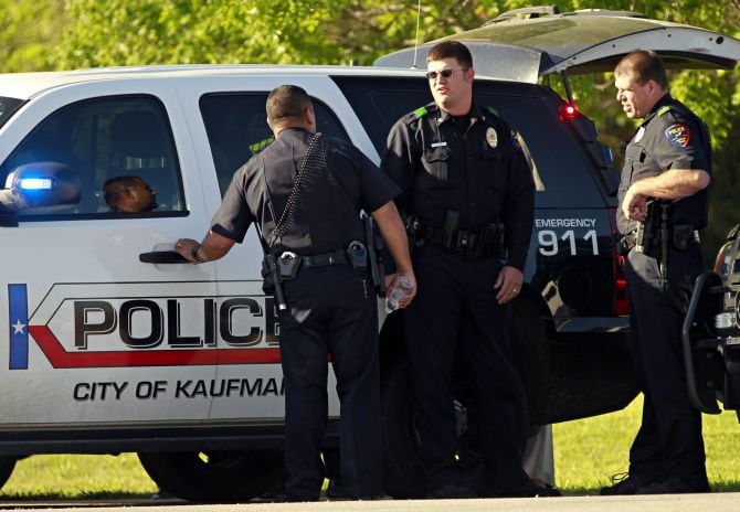 Kaufman police officers manned a roadblock Friday as officials searched the home of Eric Williams, a former justice of the peace.
