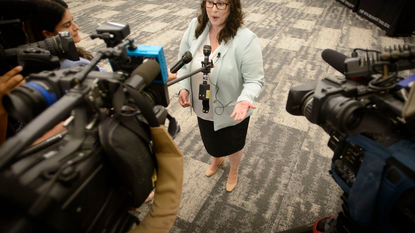 New Fort Worth ISD Superintendent Angelica Ramsey addresses the media after signing her...