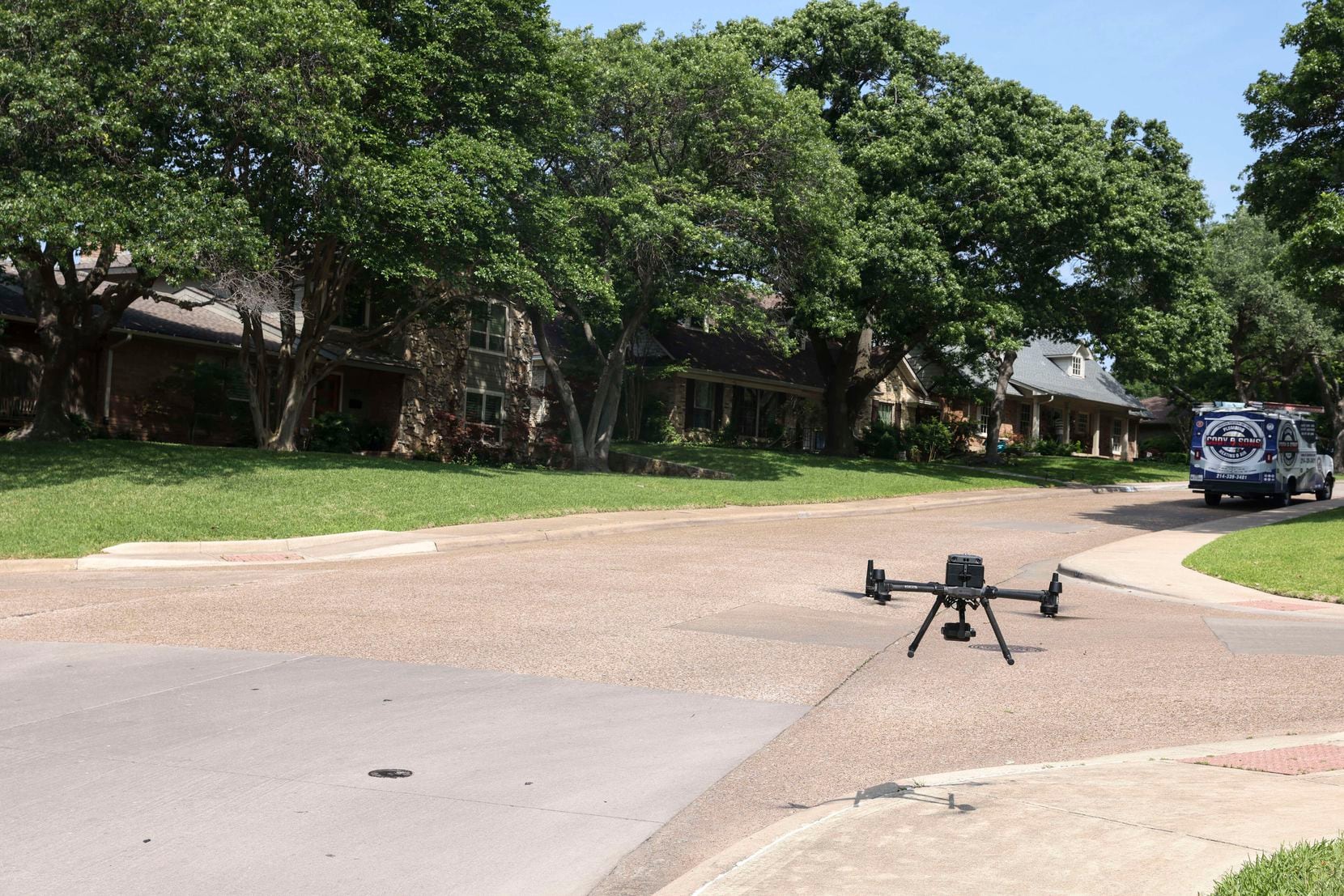 Dallas police used their new drone on Fieldcrest Drive as the search continued Wednesday for a...