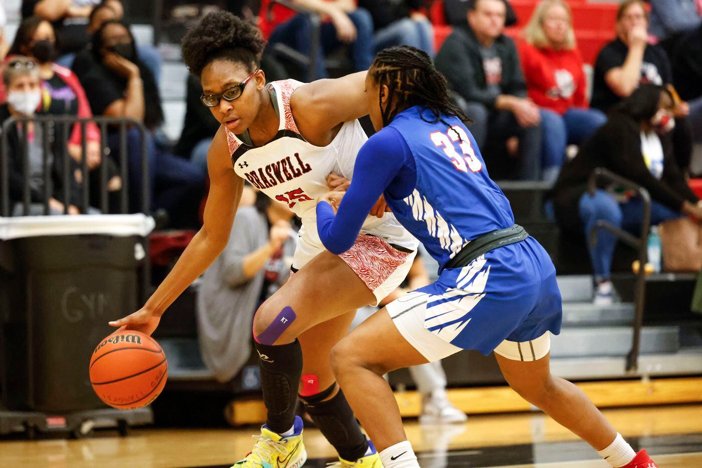 Braswell’s Alisa Williams, left, goes past Allen’s Heaven Amaechi during a district 5-6A...