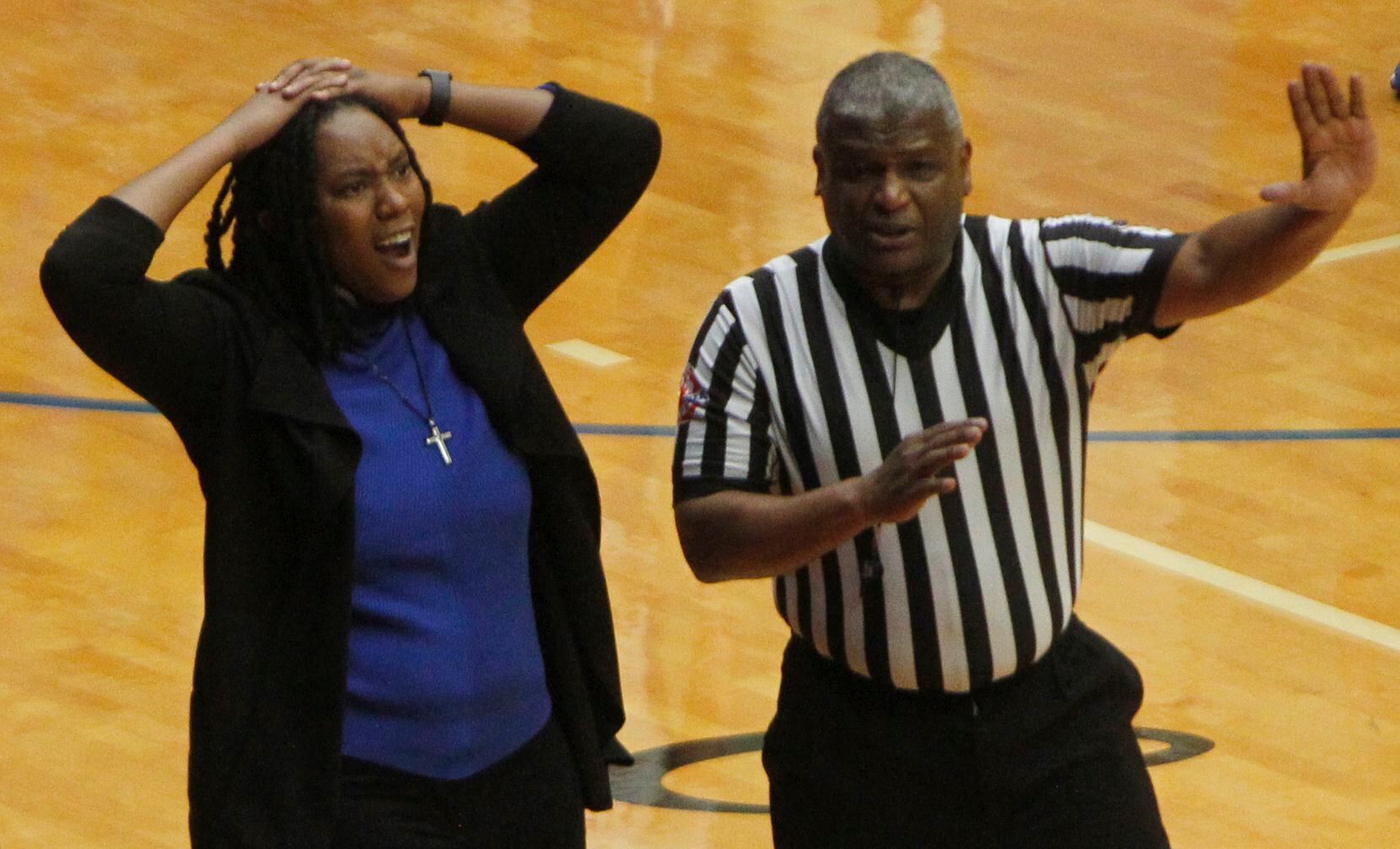 Duncanville head coach LaJeanna Howard reacts to a game official calling a foul against one...
