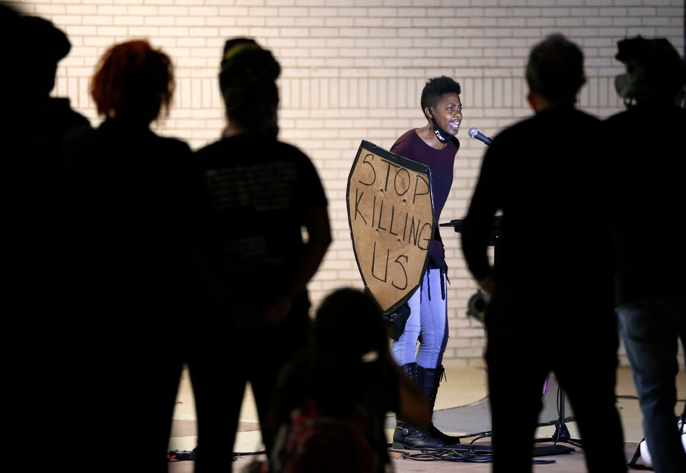 A woman who goes by the name of Ash delivers an emotional speech during a Next Generation Action Network protest outside of Dallas Police Headquarters in Dallas, Wednesday, September 23, 2020.  A Kentucky grand jury brought no charges against the Louisville police for the killing of Breonna Taylor during a drug raid gone wrong. (Tom Fox/The Dallas Morning News)
