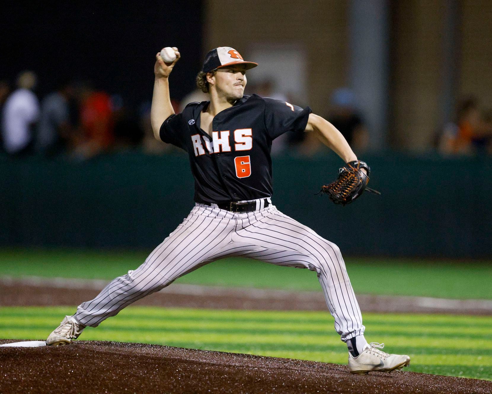 Rockwall pitcher Mac Rose (6) delivers a pitch against Waxahachie during a Class 6A Region...