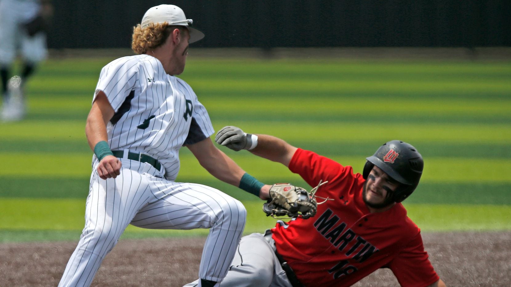 Prosper second baseman Case Pettis (5) was too late with the tag to get Martin right fielder...