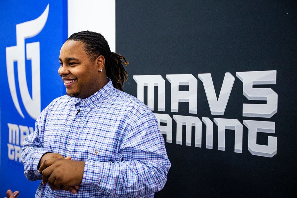 FILE - Artreyo Boyd, a.k.a. Dimez, the #1 pick in the NBA2K league, talks with guests during...
