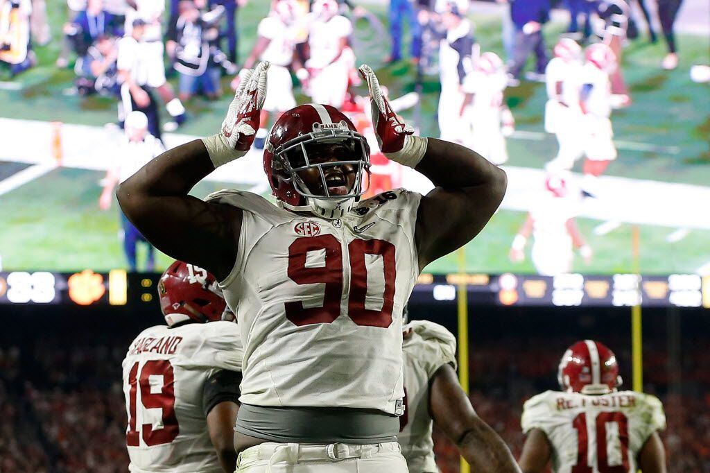 Jarran Reed #90 of the Alabama Crimson Tide celebrates a play against the Clemson Tigers during the 2016 College Football Playoff National Championship Game at University of Phoenix Stadium on January 11, 2016 in Glendale, Arizona.  (Photo by Christian Petersen/Getty Images)