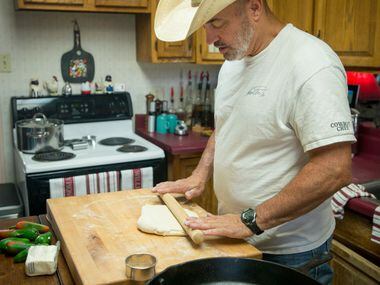 Mike Newton, known as the Cowboy Chef, prepares angel biscuits in one of his favorite...