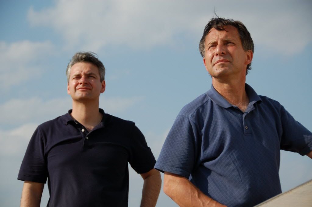 Storm-chasers Carl Young, left, and Tim Samaras.  