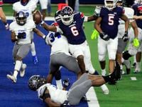 Denton Ryan’s Anthony Hill Jr. (6) breaks into the endzone for a touchdown during the first...