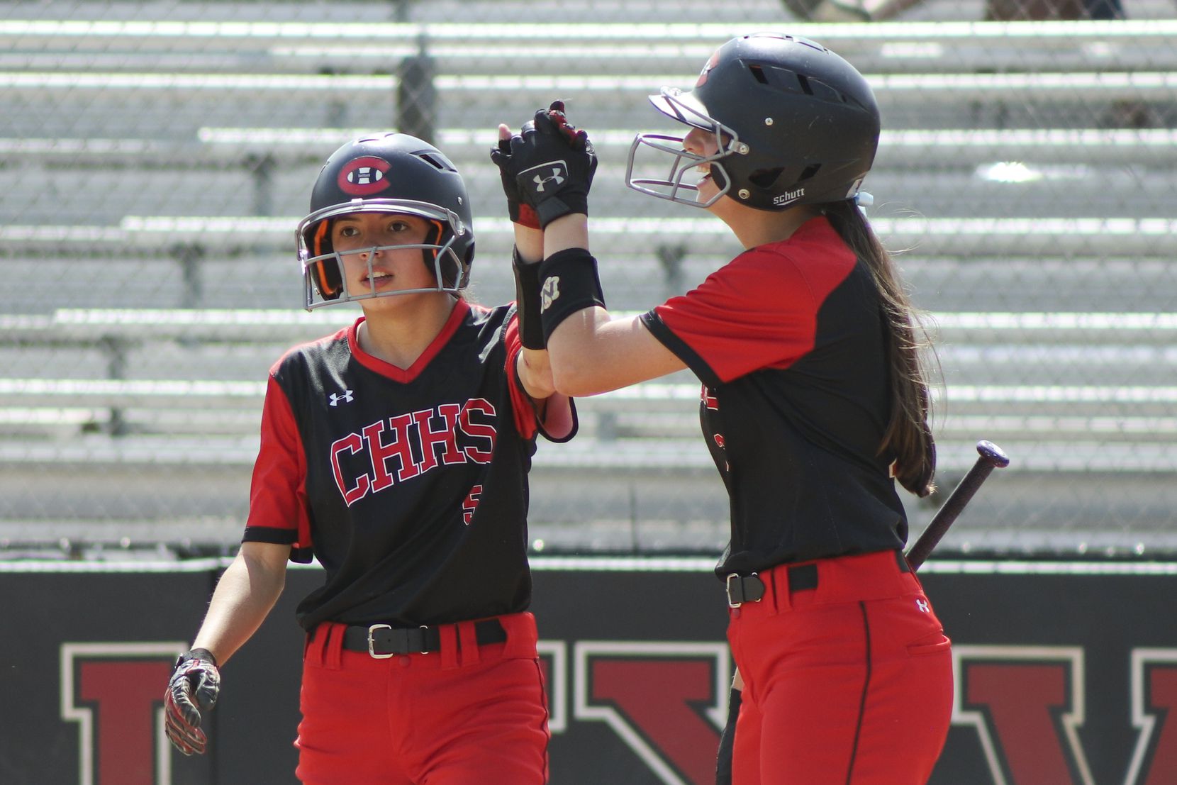 red and black softball uniforms