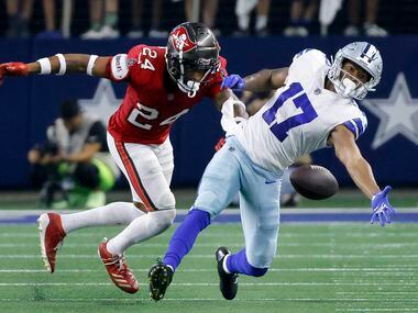 Dallas Cowboys wide receiver Dennis Houston (17) reaches in vane for a Dak Prescott pass...