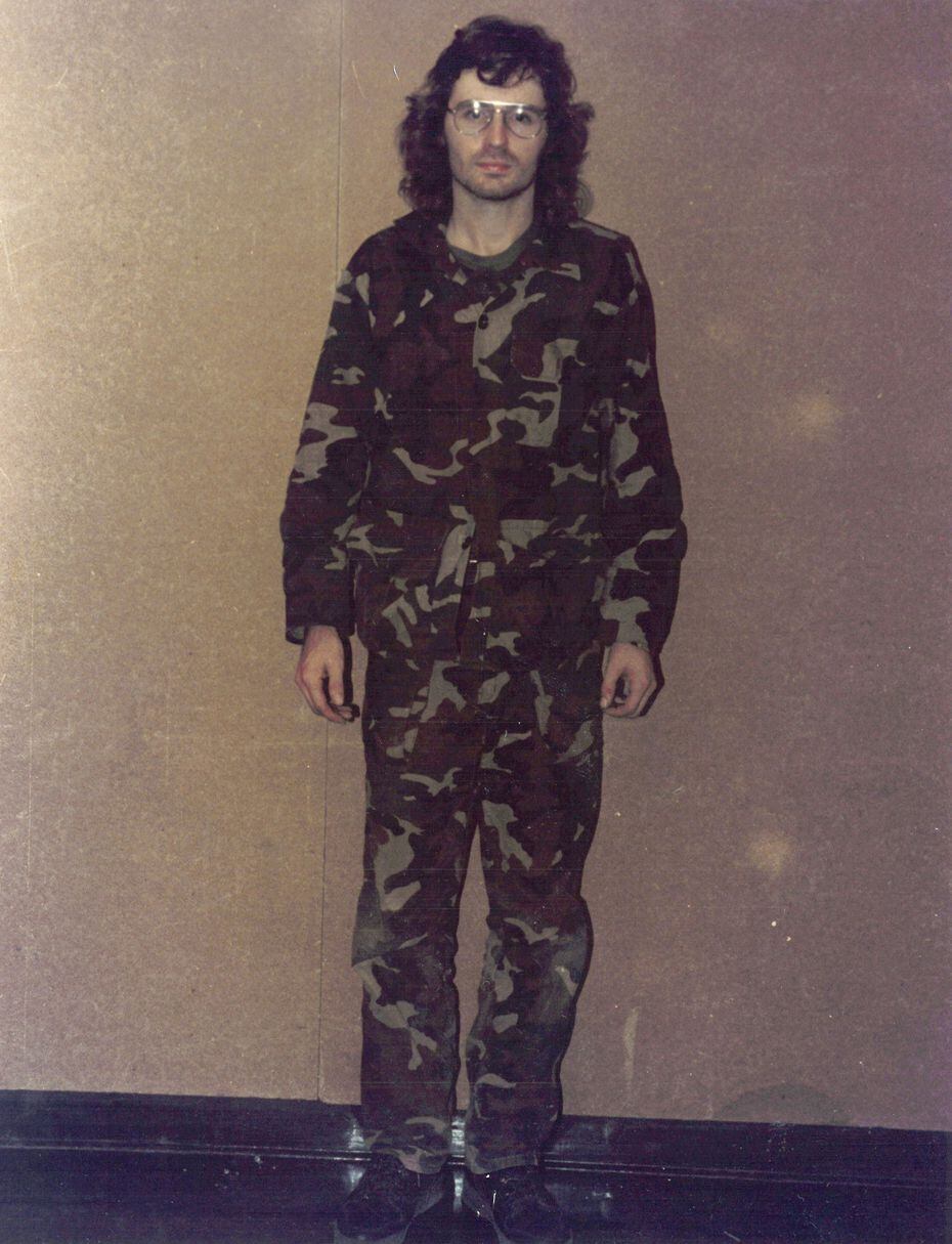 A photo taken for the McLennan County Sheriff's Office shows David Koresh, who was arrested...