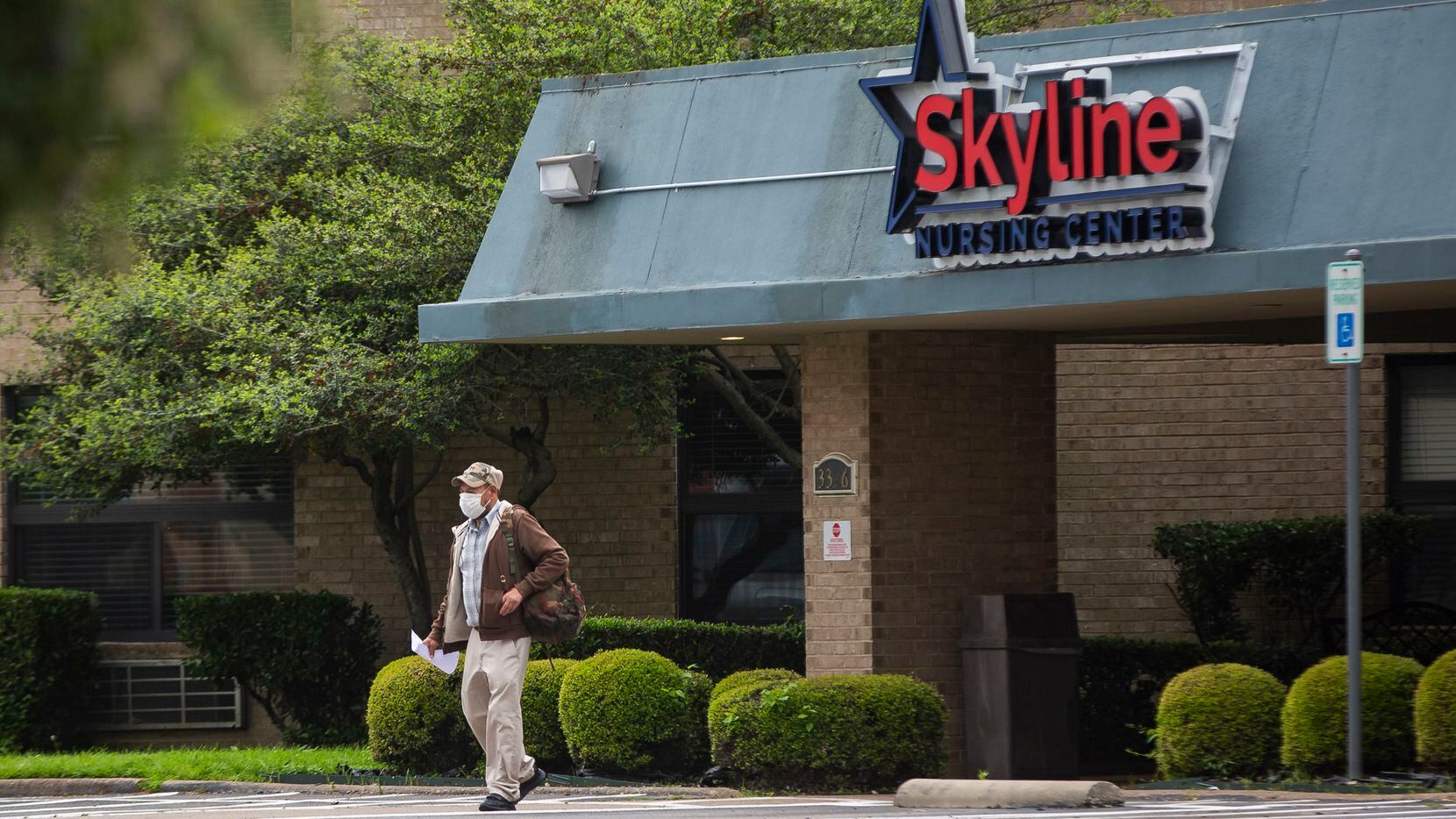 A man wearing a masks exits the Skyline Nursing Center in Oak Cliff on March 30, 2020 in Dallas. As of April 13, up to one in three of all known coronavirus-related deaths in Texas occurred in a long-term care facility. (Juan Figueroa/ The Dallas Morning News)