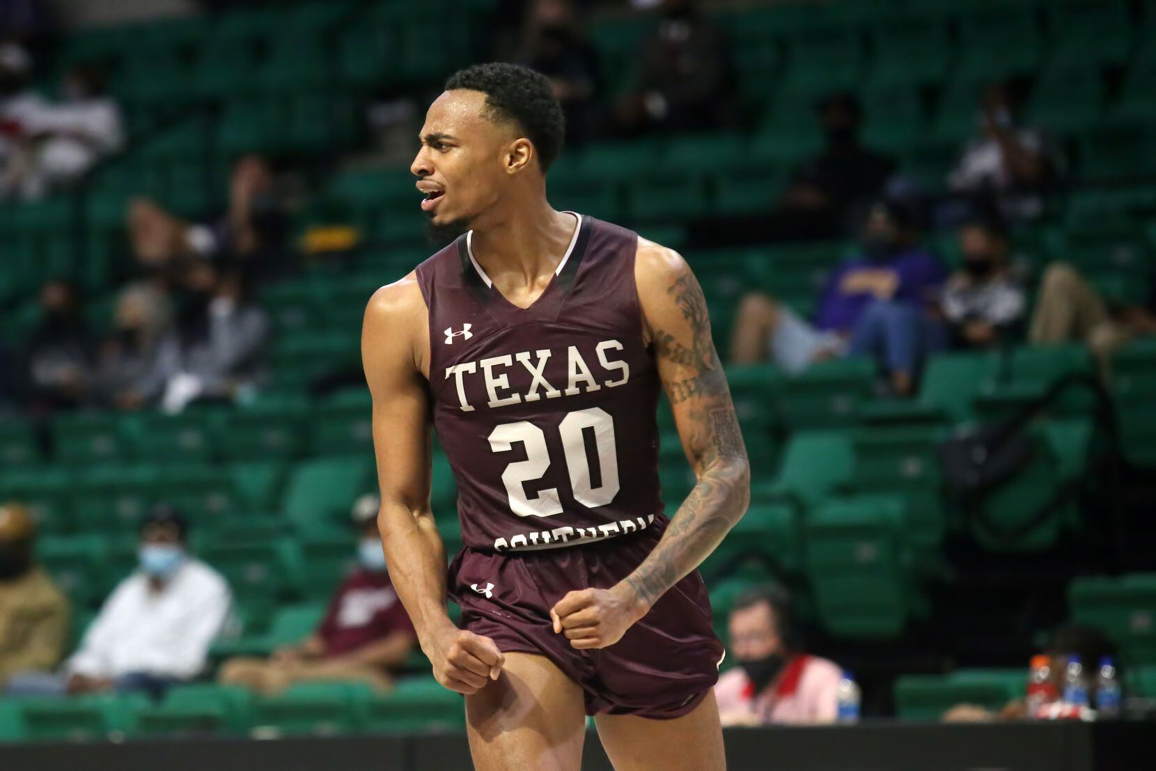Texas Southern guard Michael Weathers (20) celebrates late in the SWAC tournament...
