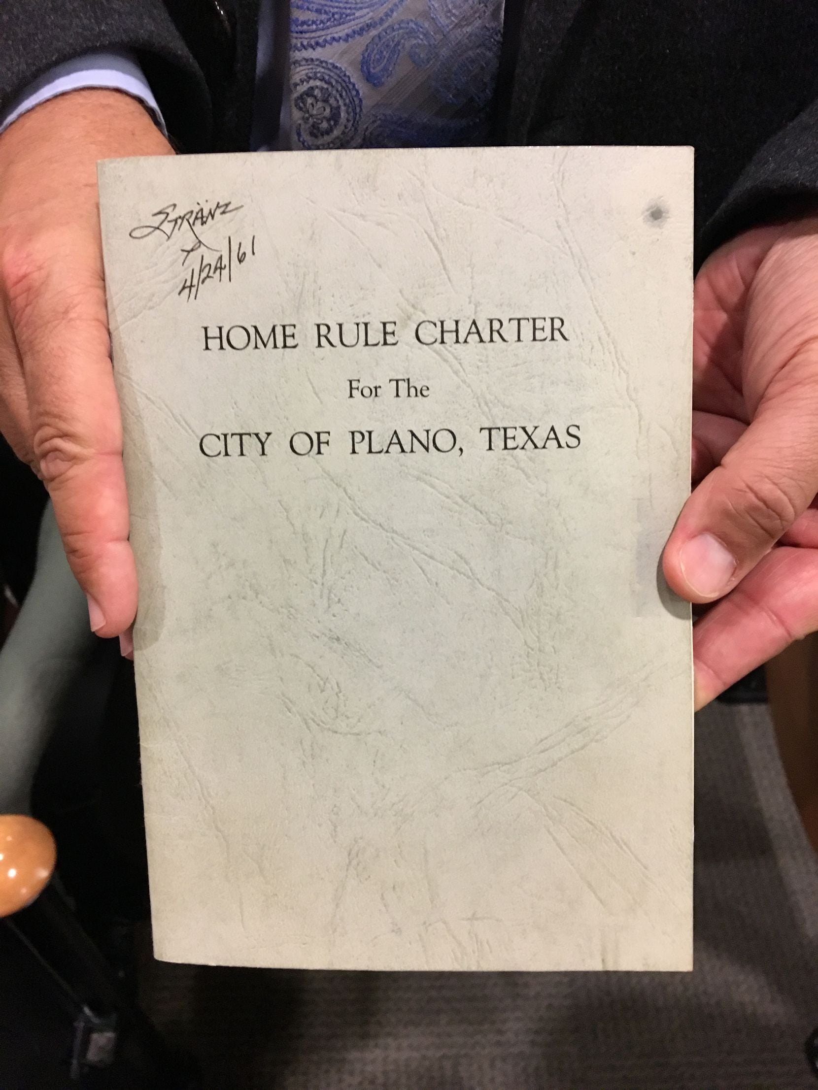 This copy of the 1961 Plano City Charter includes the signature of then Mayor Art Stranz and...