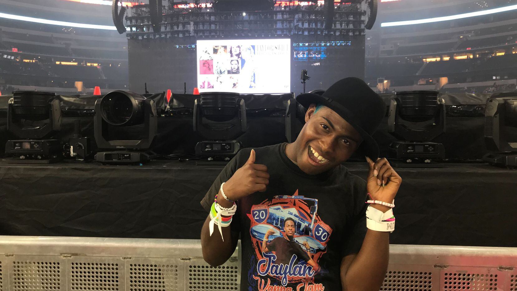 Jaylan Ford, a Taylor Swift super fan from Arlington, was gifted a signed "22" hat by Swift...