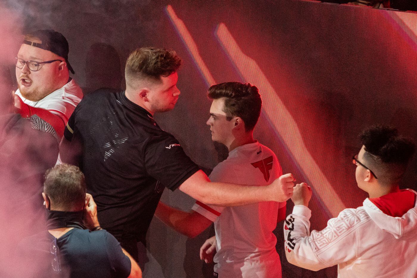 The Dallas Empire exchange fist bumps with the Atlanta FaZe after the winners final of the Call of Duty league playoffs at the Galen Center on Saturday, August 21, 2021 in Los Angeles, California. The Empire lost to FaZe 0 - 3 in their first match of the day but are still in contention to play in the finals through the elimination finals. (Justin L. Stewart/Special Contributor)