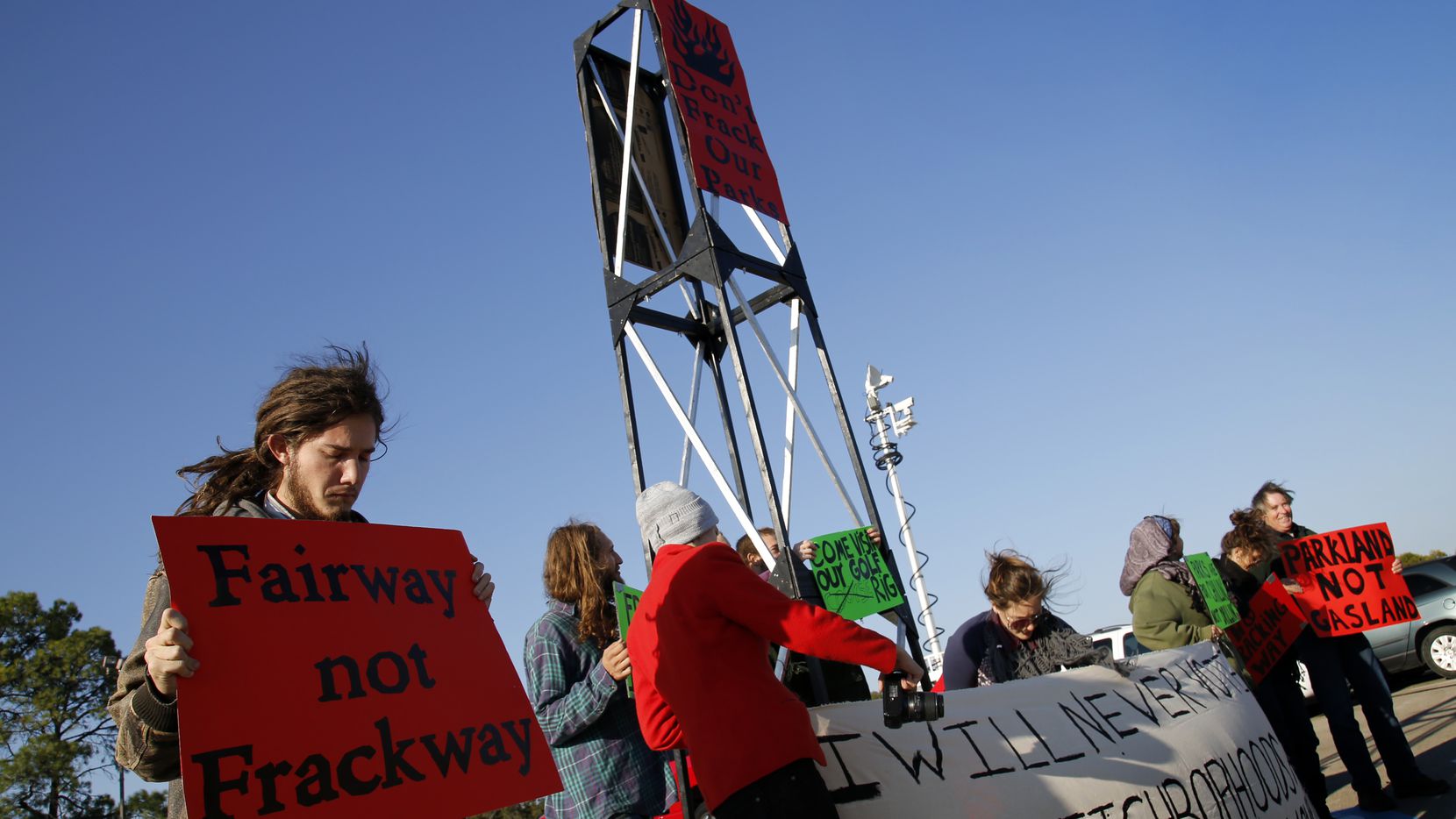 Protesters demonstrated during the city of Dallas' official Luna Vista Golf Course re-opening on October 26, 2012. This is near the land where Trinity East Energy had once hoped to drill for natural gas.